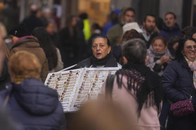 Spain's bumper Christmas lottery "El Gordo" starts dishing out millions of euros in prizes