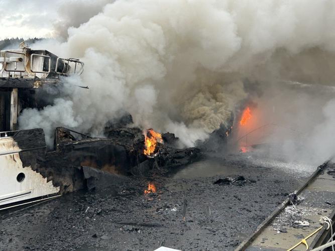 Fire chief says cause of fire that sank three yachts will likely never be found