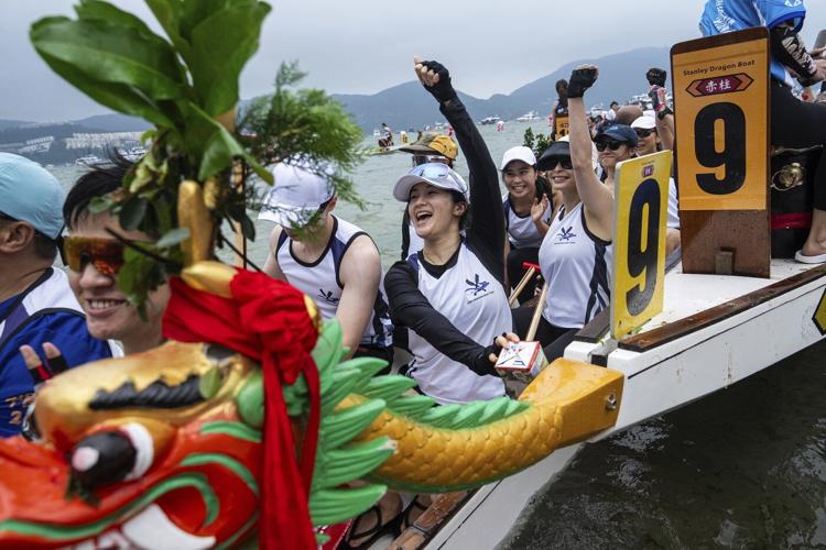 AP PHOTOS: Dragon boats thunder through Hong Kong waters to mark ancient Chinese festival