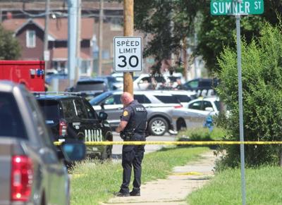 Armed bicyclist killed in Iowa shooting that wounded 2 police officers, investigators say