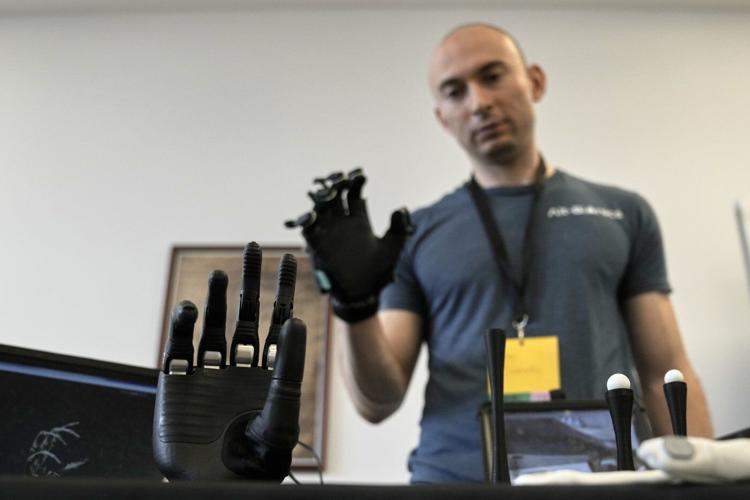 Humanoid robots showcase skills at Ancient Olympia. But they're on a long road to catch up to AI