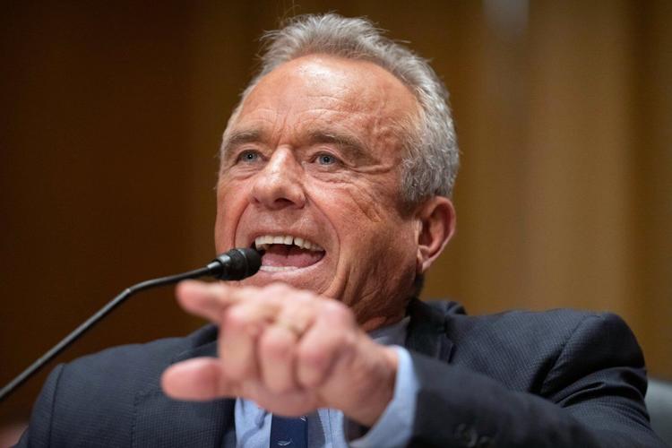 Photos from a fiery 3-hour Senate hearing with Robert F. Kennedy Jr.