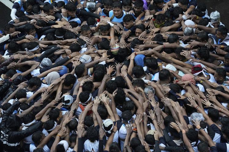 Hindus celebrate the birth of Lord Krishna in India and Nepal, in photos