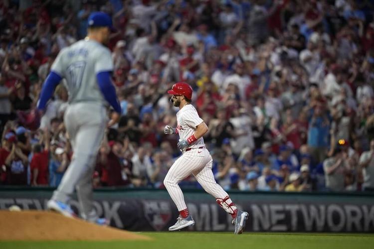 Harper hits grand slam, streaking Phillies rout Blue Jays 10-1