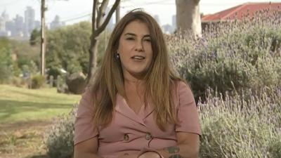 Woman charged with assaulting Australian senator who shouted at the king