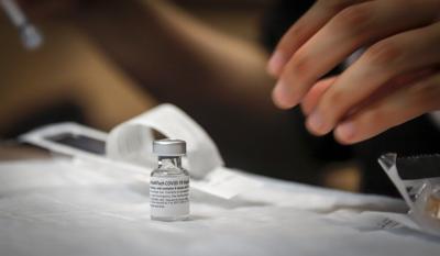 Alberta government to start charging residents for COVID-19 shots this fall