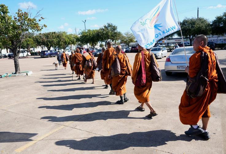 Buddhist monks resume 2,300-mile walk for peace after accident near Houston