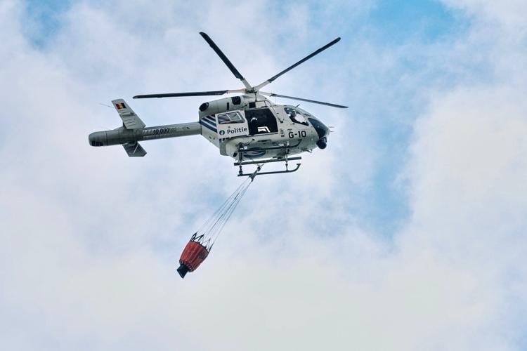 Belgian wildfire approaches Germany as Greece probes deadly blaze