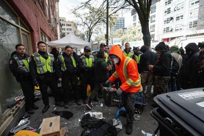 Vancouver's homeless shelters are overwhelmed following heavy rainfall and decampment