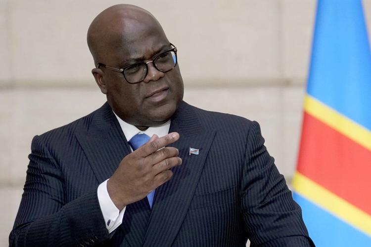 Congo's president says he'll create a unity government as violence spreads