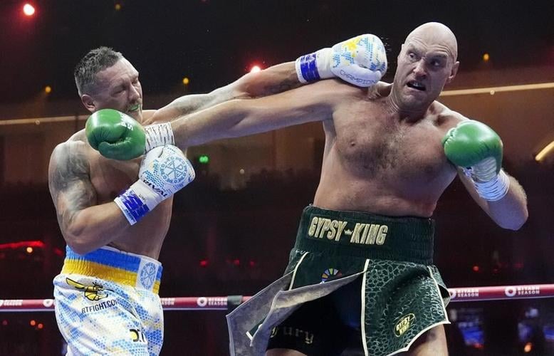 Oleksandr Usyk beats Tyson Fury by split decision to become the undisputed heavyweight champion