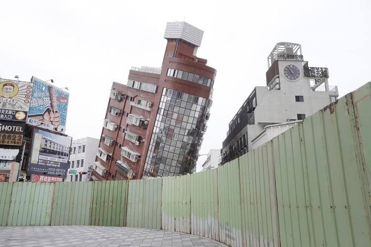 Rescue teams searching for family feared trapped in rockslide following Taiwan earthquake