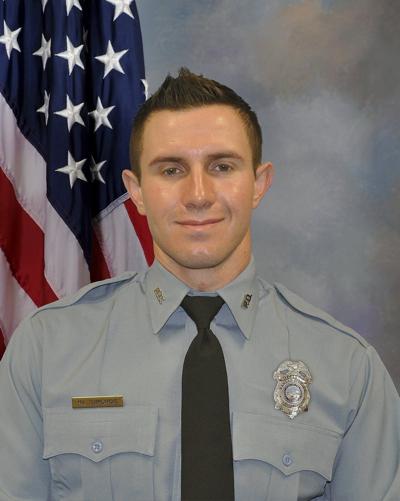 A Kansas City, Kansas, police officer has died after being struck by a fleeing driver
