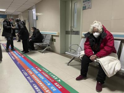 'A very hard road ahead' for China as COVID-19 cases spiral