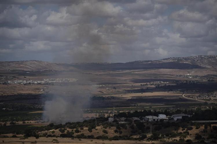 Israel says halting Hezbollah attacks is now a war goal as officials warn of a wider operation