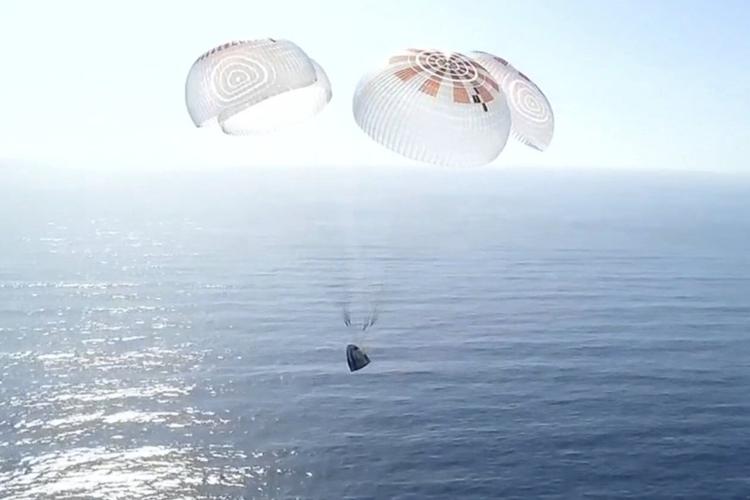 Four space tourists return to Earth after a private flight over the poles