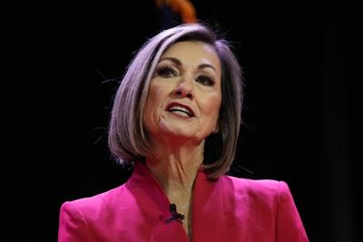 Iowa governor signs gender-affirming care ban, bathroom law