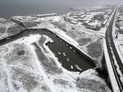 Heavy snow in northern England causes havoc on highways and knocks out power