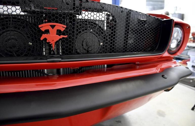 Racers, mechanics, tinkerers converting classic cars to EVs