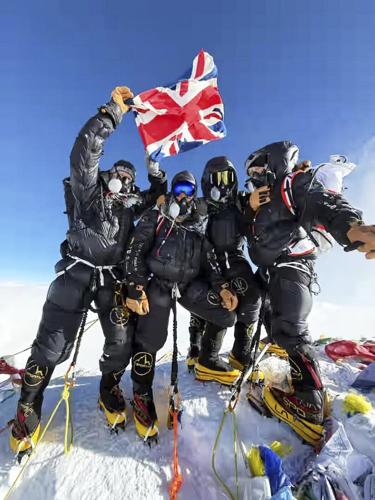 A renowned mountain guide puts clients on Everest summit less than a week after they left London