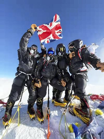 A renowned mountain guide puts clients on Everest summit less than a week after they left London