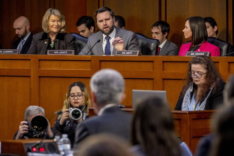 Vance takes on a more visible transition role, working to boost Trump's most contentious picks