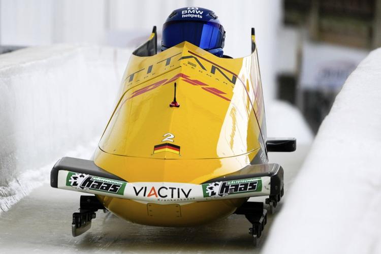 Germans hold 1-2-3 spots midway through 2-man world bobsled championship, with US in medal hunt