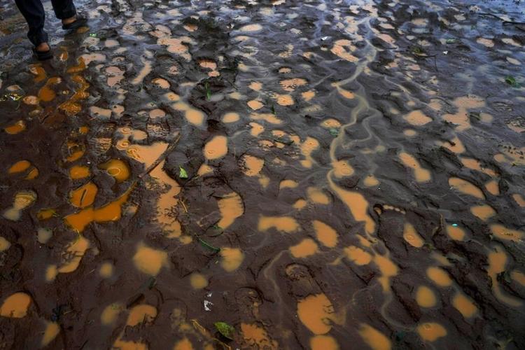 Rescuers find more bodies in landslide-hit village in western India, bringing the death toll to 21