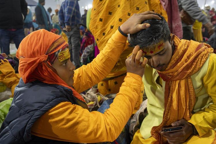 Sacred strokes of color on foreheads are a major display of Hinduism at India’s Maha Kumbh festival