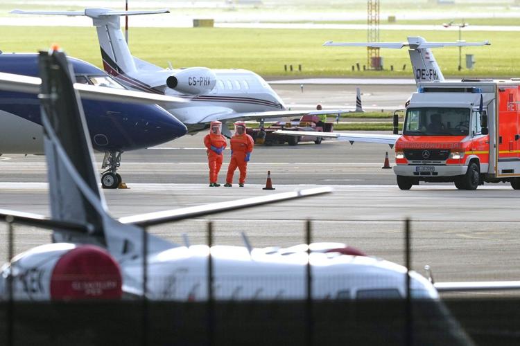 The Latest: Cruise ship hantavirus patients arrive in Europe for treatment