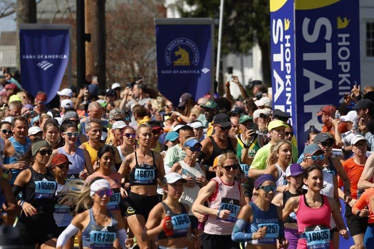 Ethiopia's Sisay Lemma wins Boston Marathon in runaway. Kenya's Hellen Obiri repeats in women's race