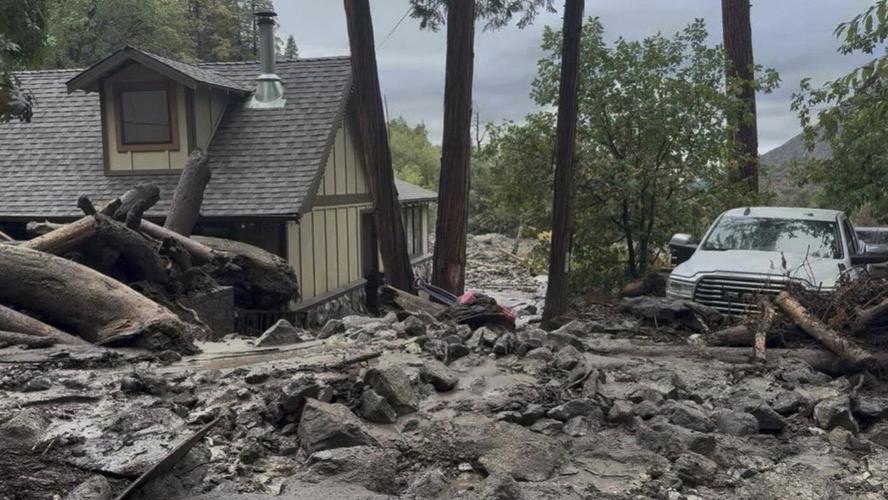 Mudslides trap drivers, bury roads and damage homes in southern California