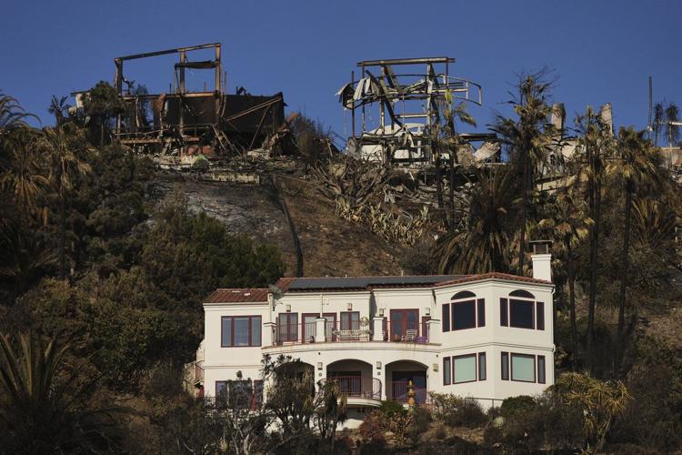 Why are lone homes left standing after the fires? It's not entirely luck