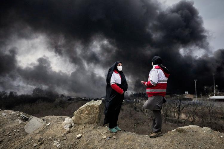 After attacks on Iran's oil facilities, toxic black rain endangers the public