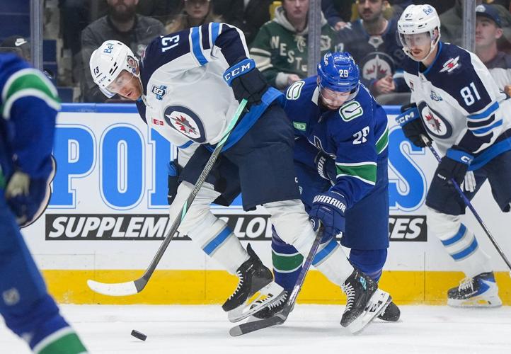 Morrissey's three points power Winnipeg Jets to 5-3 victory over Vancouver Canucks