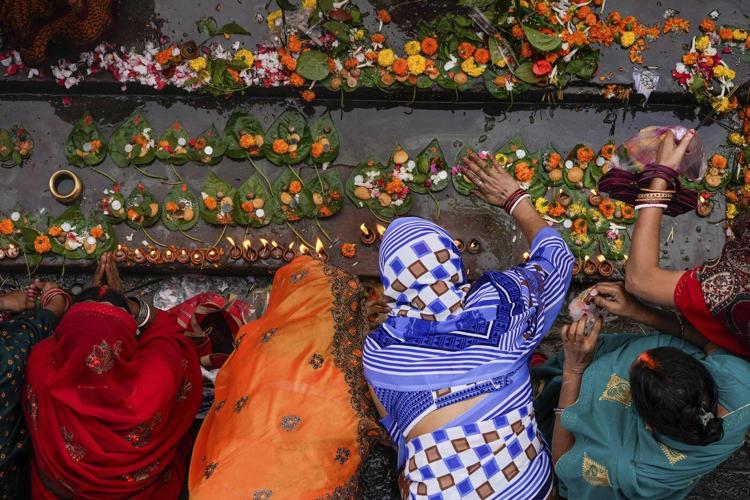 Millions of pilgrims and naked, ash-smeared ascetics take holy dips in India's mega Hindu festival