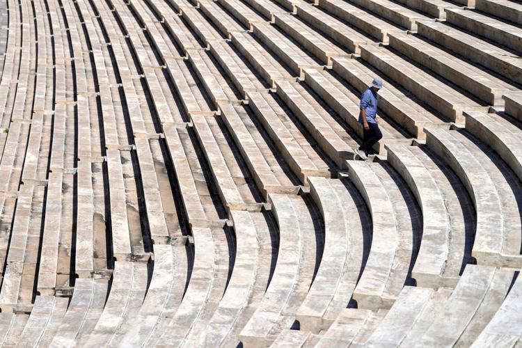 Athens is cleaning its all-marble Olympic stadium for the first time in more than a century