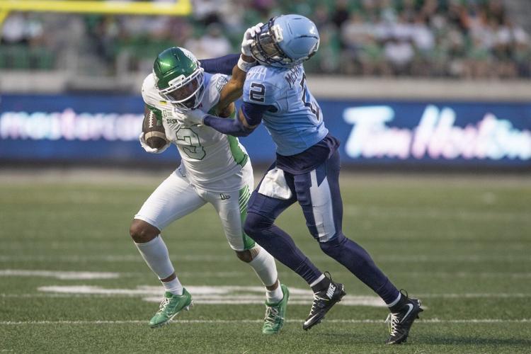 Kelly throws for over 300 yards, leads Argos to 40-34 win over Roughriders