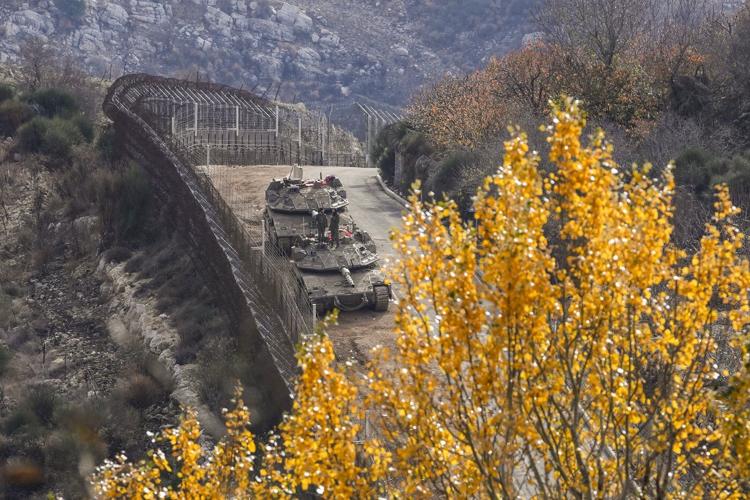 Middle East latest: Israel bombs 100s of sites in Syria as army pushes into border zone