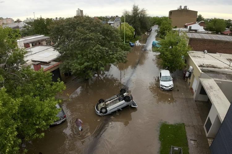 Officials say heavy rains in Argentina kill at least 15 as dozens reported missing