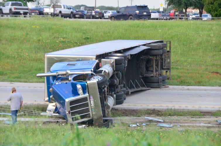 Cha-ching! Millions of dimes spill onto Texas highway after truck rolls