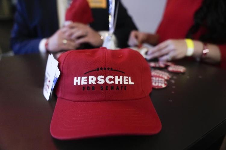 Warnock, Walker locked in tight race in Ga.; runoff possible