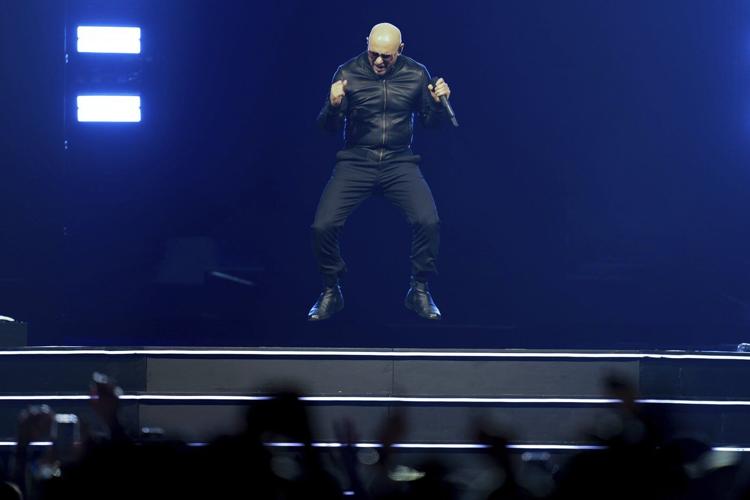 Pitbull is a fan of his fans. He says it's his job to make them feel good