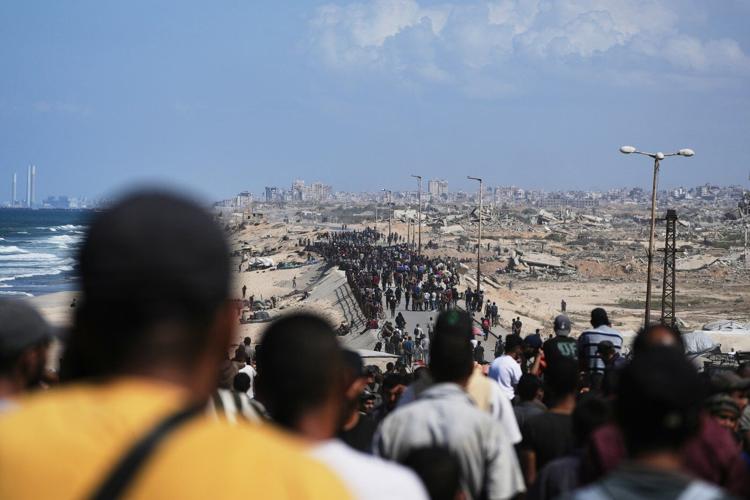 The Latest: Tens of thousands of Palestinians in Gaza return north as ceasefire takes effect