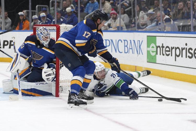 Broberg scores in OT to lift Blues over Canucks 4-3 for 4th straight win