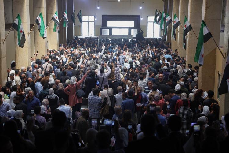 Syria’s first public trial of Assad-era officials opens in Damascus