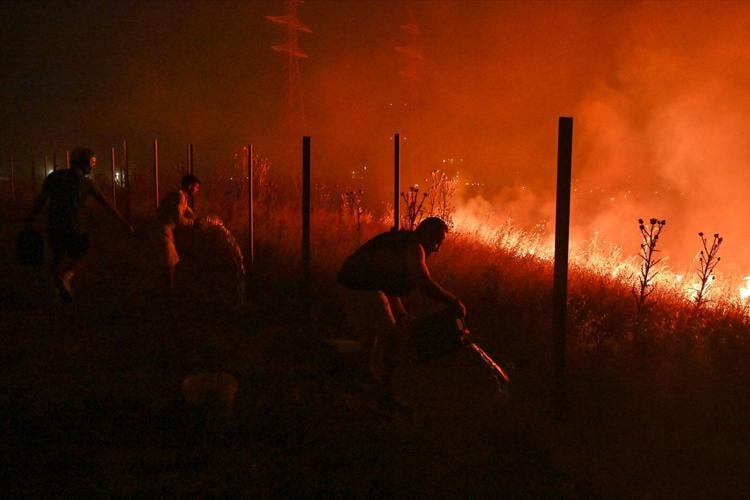 Wildfires rage in Portugal, Greece and Spain while Greek authorities warn of toxic smoke