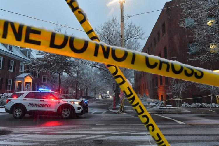 Person of interest detained in Brown University shooting that killed 2 and wounded 9