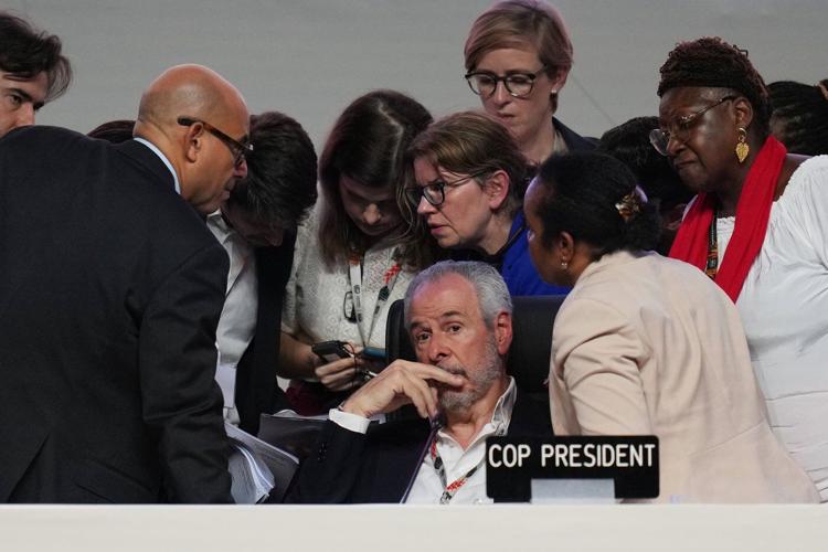 UN climate deal increases money to countries hit by climate change, but no explicit fossil fuel plan