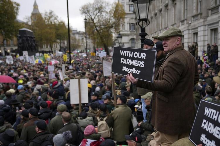 Thousands of UK farmers descend on Parliament to protest a tax they say will ruin family farms